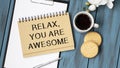 yellow paper with text Relax, you are awesome