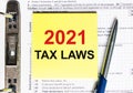 Yellow paper with text 2021 tax laws