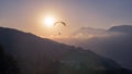 Yellow Paraglider at Sunset