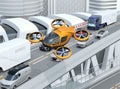 Yellow passenger drone flying over cars in heavy traffic jam