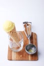 Yellow passion fruit ice cream cone with special scoop spoon