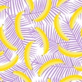 Yellow pastel banana on a purple palm leaves background exotic s