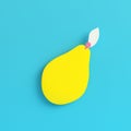 Yellow pear on bright blue background in pastel colors