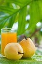Yellow pear tropic fruit refreshment smoothie Royalty Free Stock Photo