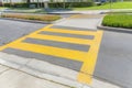 Yellow pedestrian lanes at the crosswalk in Ladera Ranch, California