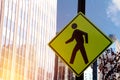 Yellow pedestrian traffic diamond shaped sign