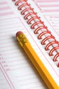 Yellow pencil on agenda Royalty Free Stock Photo