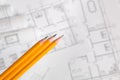 Yellow pencil on architectural blueprint background Royalty Free Stock Photo