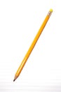 Yellow pencil and writing pad Royalty Free Stock Photo