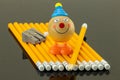 Yellow pencils arranged at a row on a black background. On it ar Royalty Free Stock Photo