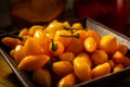 Yellow peppers with detail of saffron and paprika glasses.
