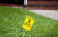 Yellow Pesticide Application Warning On Green Lawn Royalty Free Stock Photo