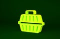 Yellow Pet carry case icon isolated on green background. Carrier for animals, dog and cat. Container for animals. Animal