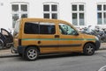 Yellow Peugeot Partner van in Copenhagen