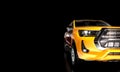 yellow pickup truck on black background