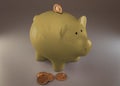 Yellow piggy bank with cryptocurrencies, golden physical coins, Ripple, Zcoin, Bitcoin and Etherium. Mining cryptocurrency