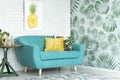 Turquoise couch in sitting room Royalty Free Stock Photo