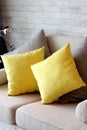 Yellow pillows in living room apartment