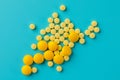 Yellow pills . Blue background with copy space for text Royalty Free Stock Photo