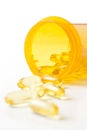 Yellow Pills with Prescription Bottle Royalty Free Stock Photo