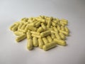 The mountain of pills on white background, yellow pills, vitamin Royalty Free Stock Photo