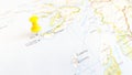 A yellow pin stuck in the island of Iona on a map of Scotland Royalty Free Stock Photo