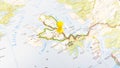 A yellow pin stuck in the island of sky on a map of Scotland