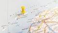 A yellow pin stuck in the island of Terschelling on a map of the Netherlands Royalty Free Stock Photo