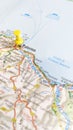 A yellow pin stuck in Palermo Sicily on a map of Italy portrait Royalty Free Stock Photo