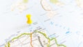 A yellow pin stuck in Rathlin Island on a map of Northern Ireland