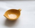 Yellow Pinch Bowl in an Isolated White Background 1 Royalty Free Stock Photo