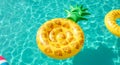 Yellow Pineapple Inflatable Pool Float in Blue Water Royalty Free Stock Photo
