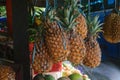 Yellow pineapples hanging in local fruit market in Indonesia Royalty Free Stock Photo