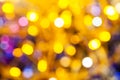 Yellow pink blurred shimmering Christmas lights Royalty Free Stock Photo