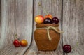 Yellow-pink cherries in a clay pot.