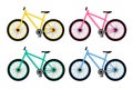 Yellow, pink, green and blue bikes on white background. Set of four bicycles. Economical and ecological city transport Royalty Free Stock Photo