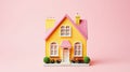 yellow pink house model on pink background with copy space Royalty Free Stock Photo