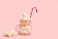 Yellow and pink marshmallows in a crystal jar Royalty Free Stock Photo