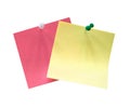 Yellow and pink sheets of paper fastened with buttons. Royalty Free Stock Photo