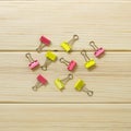 Yellow and pink stationery clips