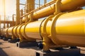 Yellow Pipes and Valves in an Industrial Facility Against the Sky