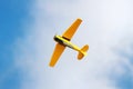 Yellow plane in the sky