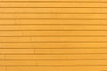 Yellow plank wall. Horizontal lines