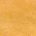 Yellow plaster seamless texture for background Royalty Free Stock Photo