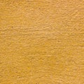 Yellow plaster seamless texture for background Royalty Free Stock Photo