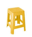 Yellow plastic chair isolated on white bsckground Royalty Free Stock Photo