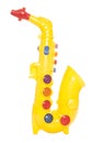 Yellow plastic childs saxophone toy Royalty Free Stock Photo