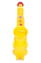 Yellow plastic childs saxophone toy Royalty Free Stock Photo