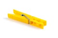 Yellow plastic clothespin Royalty Free Stock Photo