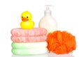 Yellow plastic duck over sponges and boat bath dis Royalty Free Stock Photo